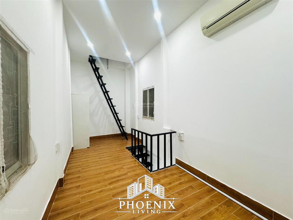 1 trệt 1 lầu cao 2m  mới xây  ban công ngay trường chinh  cầu tham lương