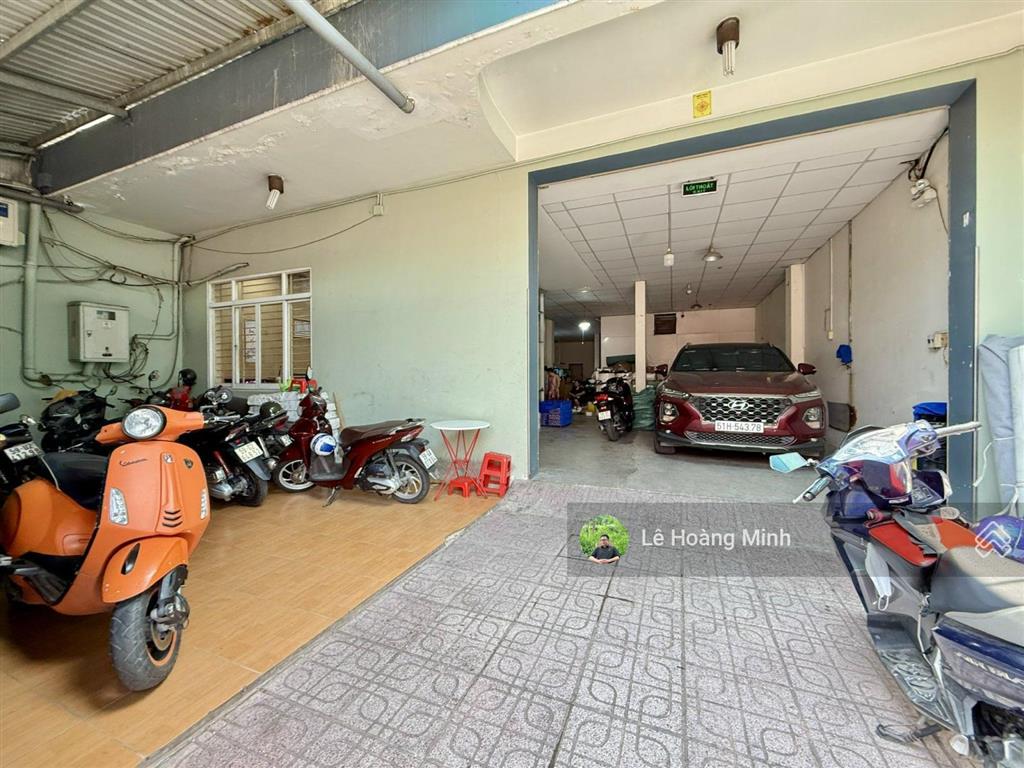 Tòa nhà 5 tầng 10m x 25m. có thang máy mặt tiền đường hiệp thành 06. đoạn gần chợ hiệp thành