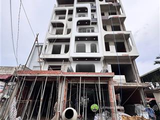 Tòa nhà 7 tầng có thang máy. ngay bờ kè tham lương. ngã tư nguyễn văn quá. quang trung