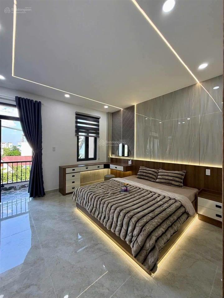 Siêu phẩm đẹp mê 5,5m x 16m. 4 tầng thang máy hẻm 8m thông hà huy giáp. ngay cđ điện lực