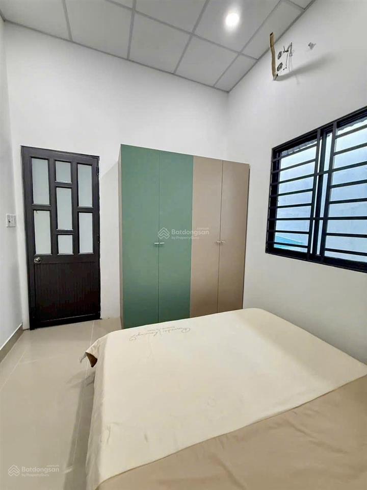 Bán gấp nhà quốc lộ 1a ngay trường đại học nguyễn tất thành, 50,2m2, 2 tầng, đường 5m