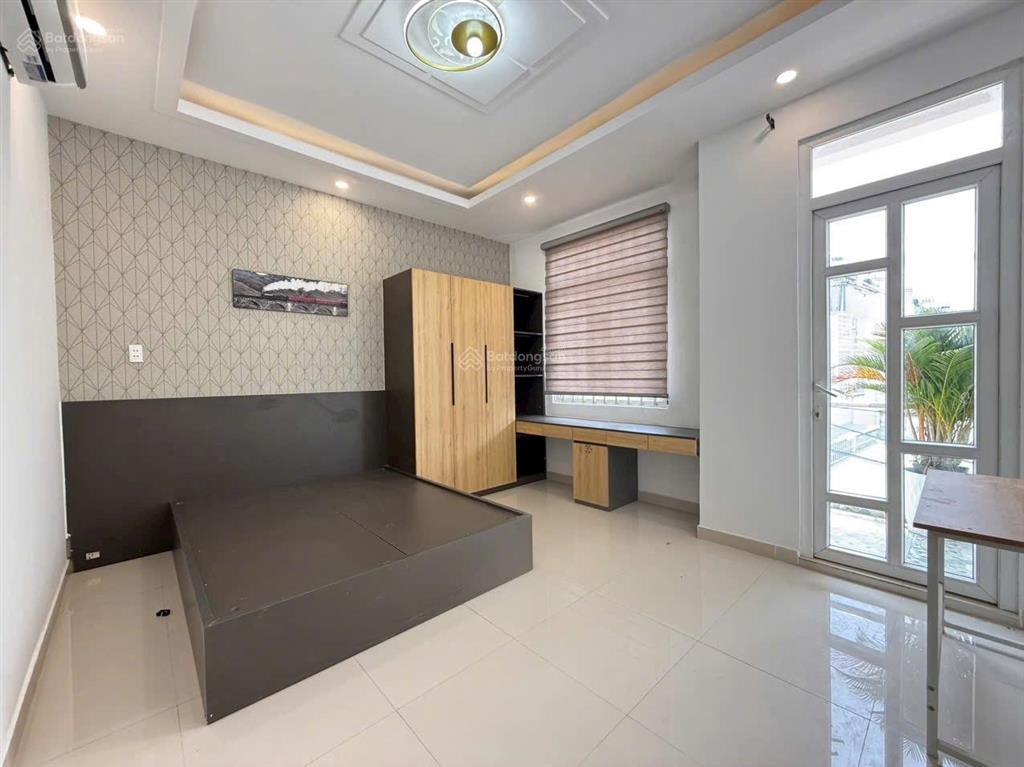 Nhà mới 1 trệt 2 lầu đường ô tô 7m sát mặt tiền (4,5x17) công nhận 56m2 thổ cư giá chỉ 5ty2