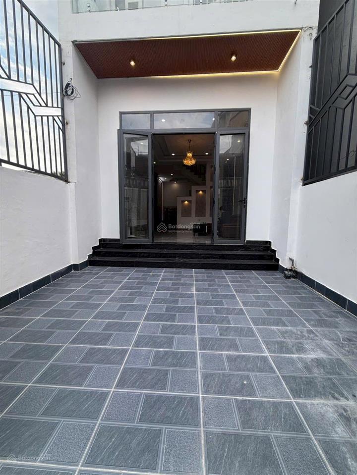 Nhà mới 1 trệt 2 lầu đường ô tô 7m sát mặt tiền (4,5x17) công nhận 56m2 thổ cư giá chỉ 5ty2