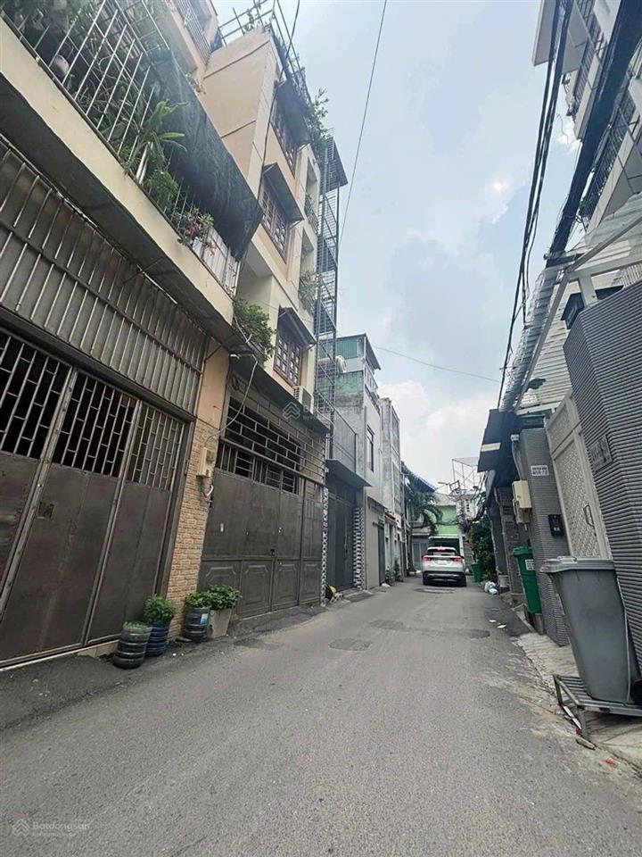 Nhà khu ẩm thực bùi đình túy  dtsd 64m2  xe hơi tận cửa  sổ vuông a4  sát mặt tiền chu văn an.