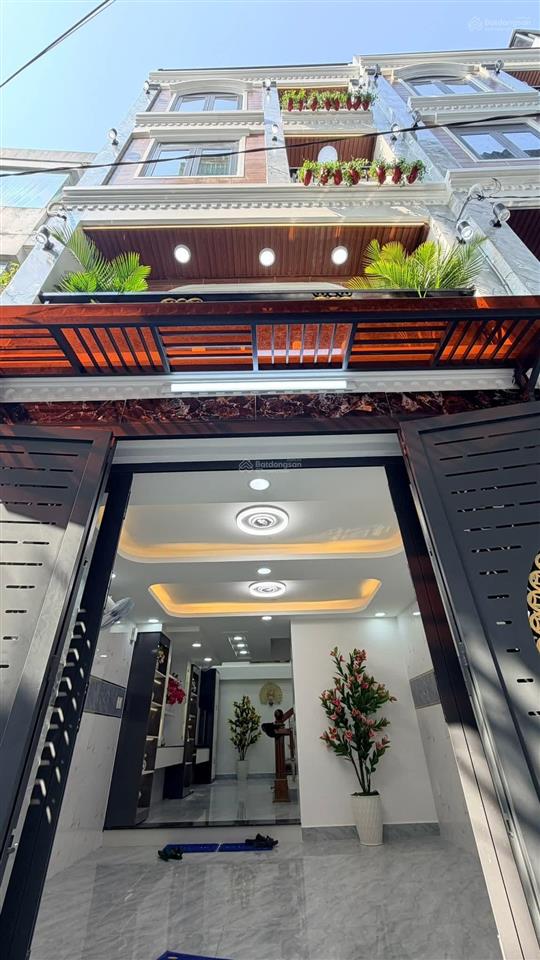 Bán nhà mới 4,5 tầng nội thất gần chợ phạm văn bạch 4x11