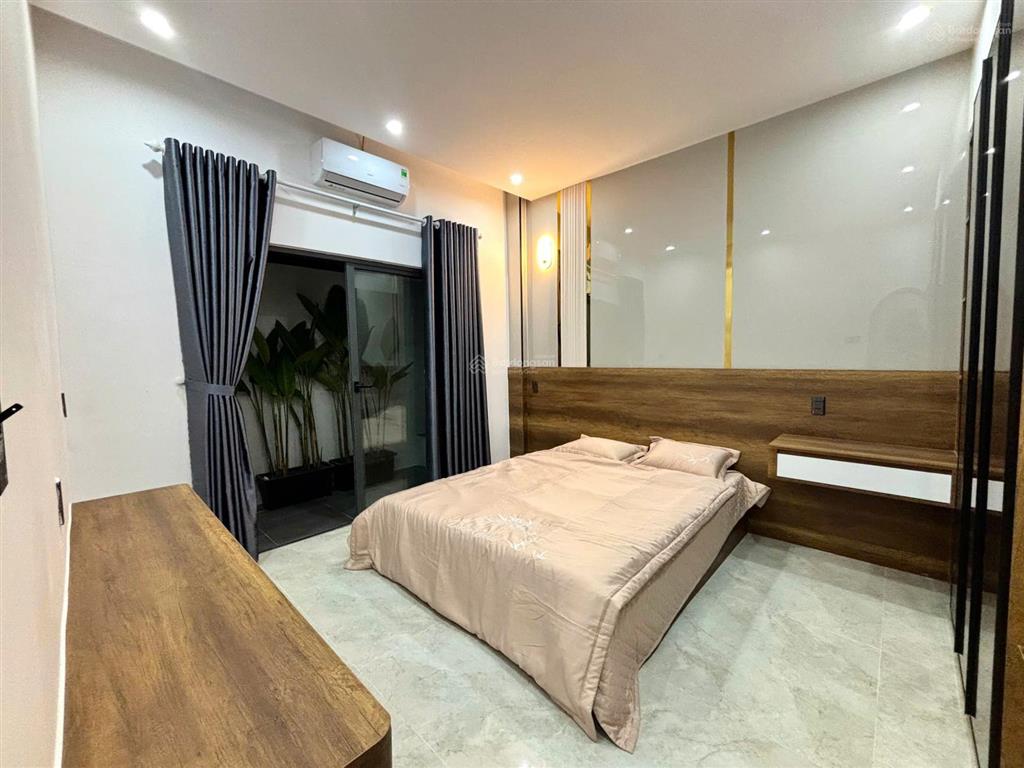 Bán tòa nhà căn hộ mini khu fpt mới xây xong dòng tiền 70tr/tháng gần sông cổ cò siêu thoáng