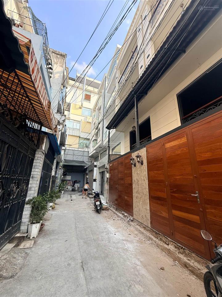 Dương quảng hàm nhà 5 tầng hẻm oto 7 chỗ ở ngay