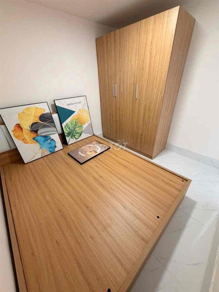 Bán nhà 1 Trệt 1 lửng 2 mặt tiền kinh doanh trước sau mới 100%