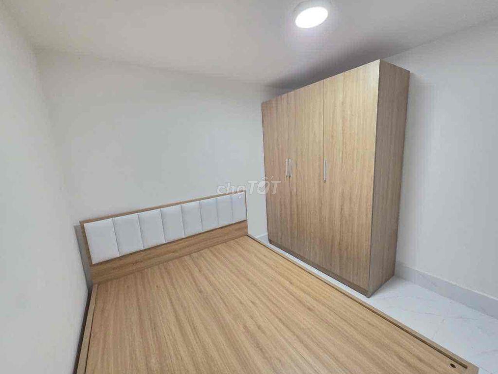 Bán nhà 1 Trệt 1 lửng 2 mặt tiền kinh doanh trước sau mới 100%