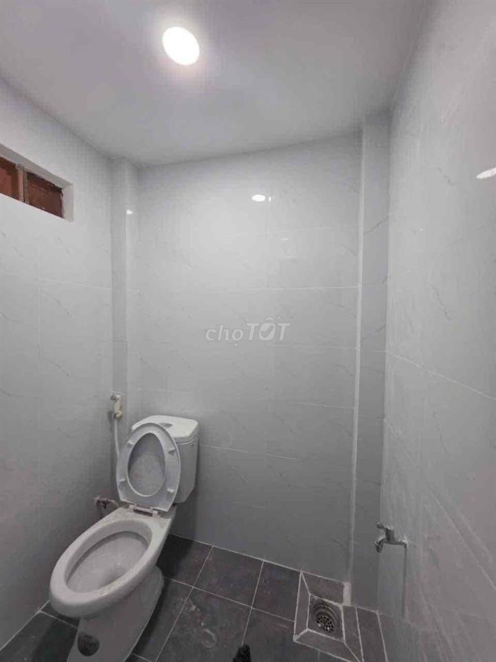 Bán nhà 1 Trệt 1 lửng 2 mặt tiền kinh doanh trước sau mới 100%