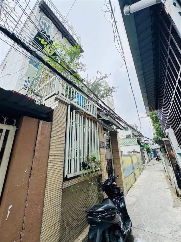 Bán nhà ở vừa có dòng tiền 25tr/th  gần cầu tân thuận  04 tầng 4x19m