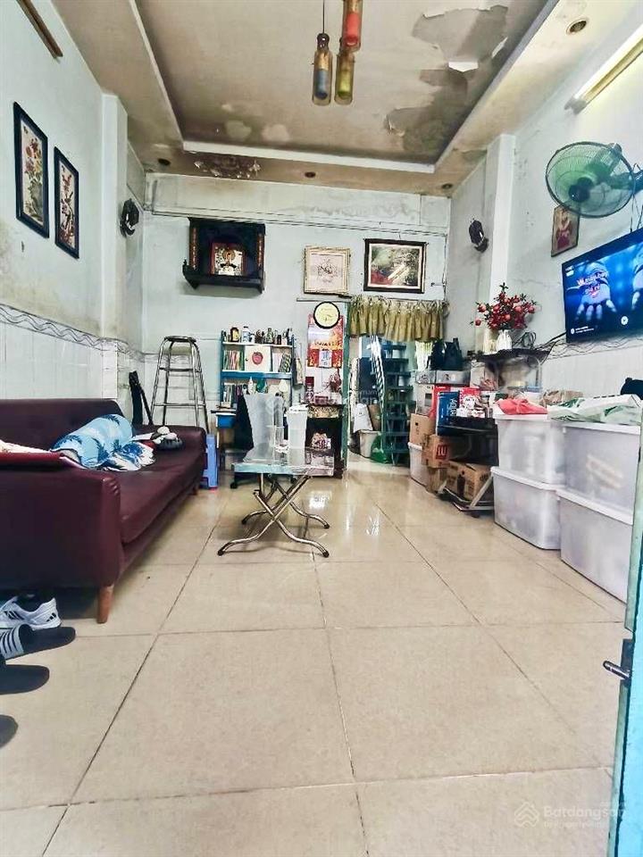 Bán nhà đ. đoàn văn bơ, 20m ra mặt tiền xe hơi, trước nhà rộng 4m, xóm chiếu, nguyễn tất thành