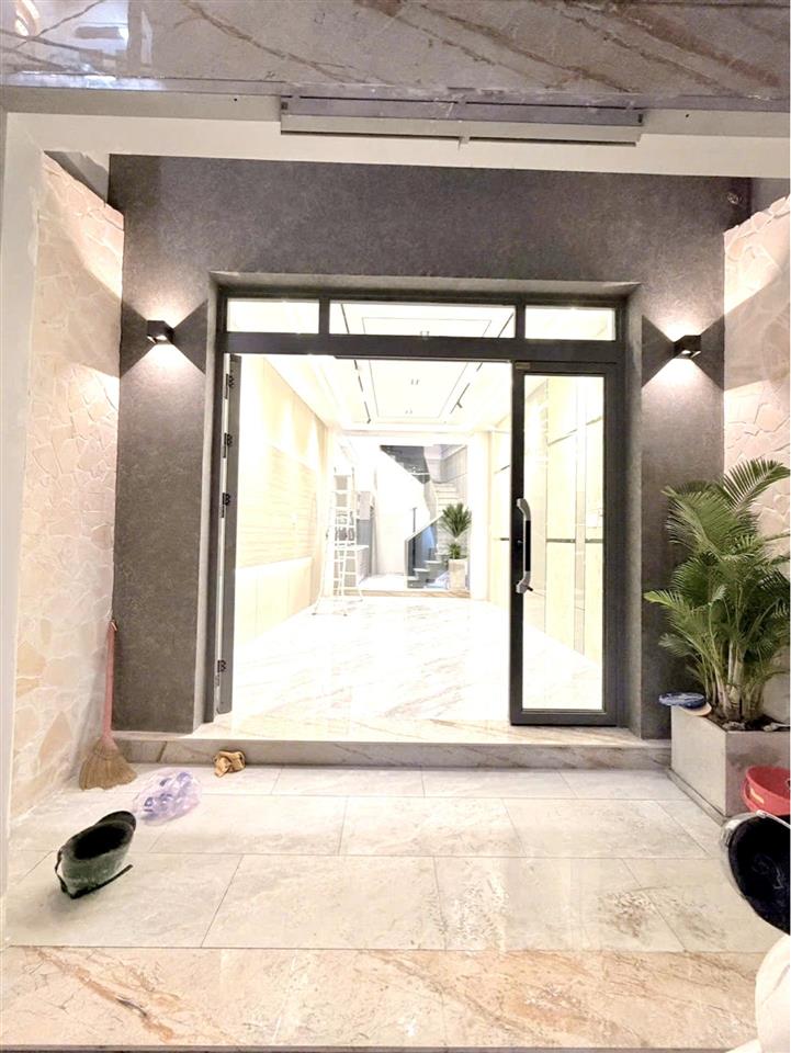 Bán nhà đẹp 5 tầng, mặt tiền hẻm xe hơi đậu cửa, đ.khánh hội, thông ra đ.số gần nguyễn tất thành