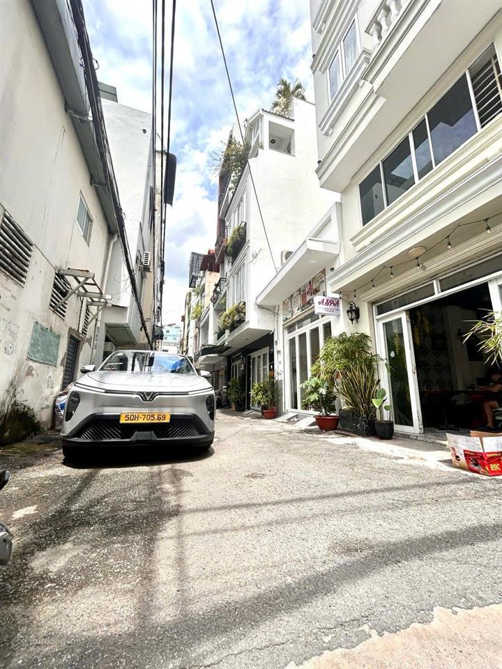 Bán nhà mt đ.số xe hơi đậu cửa  lưu thông khánh hội, hoàng diệu, bến vân đồn, nguyễn tất thành.