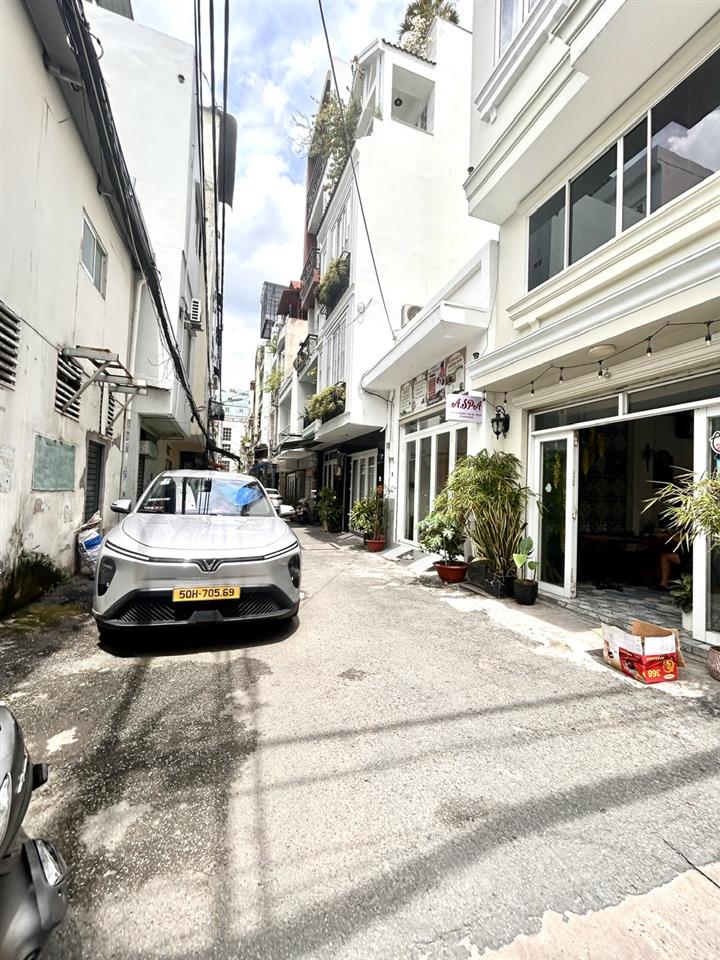 NHÀ BÁN MẶT TIỀN Đ.SỐ XE HƠI NGỦ TRONG NHÀ- GIAO THƯƠNG Đ.TÔN ĐẢN VỚI KHÁNH HỘI- BẾN VÂN