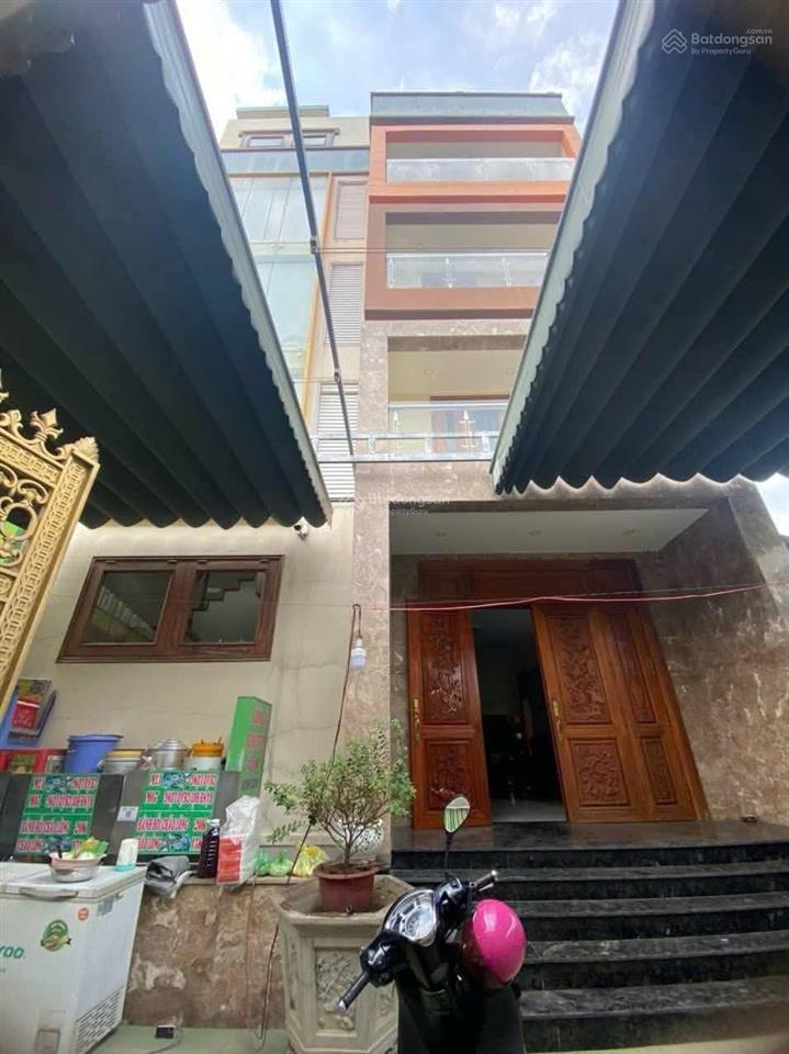 Toà nhà 5 tầng  có thang máy ( gần lê văn việt quận 9 )