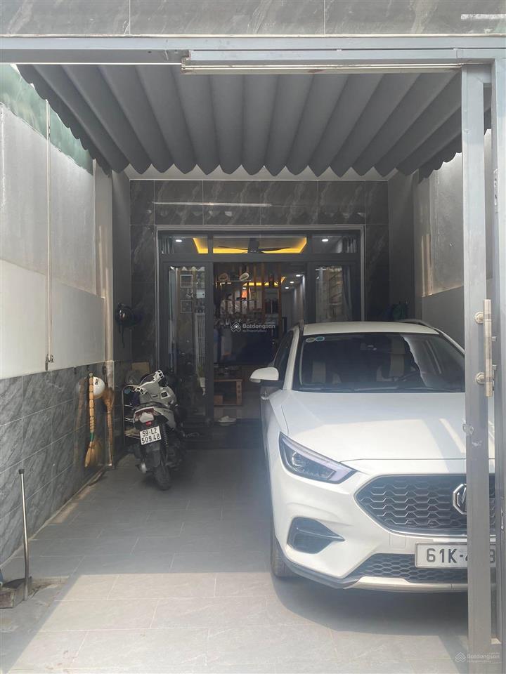 Nhà phố 2 lầu trệt đường nhựa thông, gần sân vận động đông hòa, phường dĩ an, bình dương, tp hcm