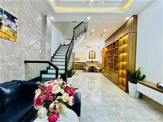 Chủ đi định cư bán nhà 3 tầng  đường thông xe  20m ra mt lê văn thọ  53m2  gần cv làng hoa