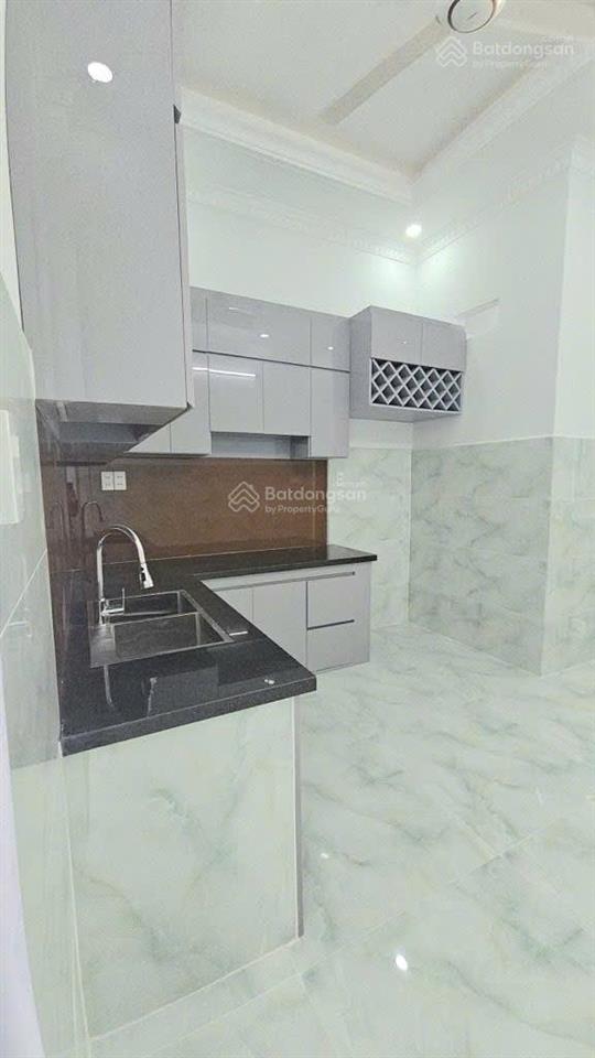 Bán nhà mới 1 trệt 2 lầu sân thượng đường lò lu long trường  hxh gần vinhomes giá 6.79 tỷ