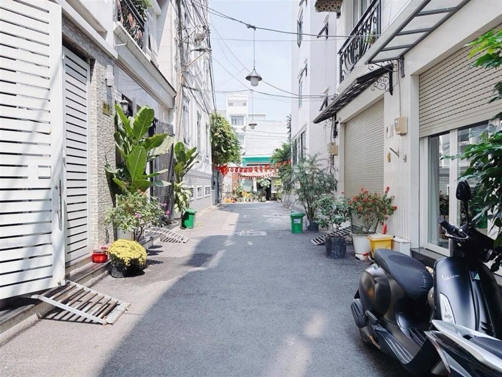 * bán nhà quận 7, 4 tầng, oto đổ cửa, gần lotte, 4x14, giá 9,99 tỷ