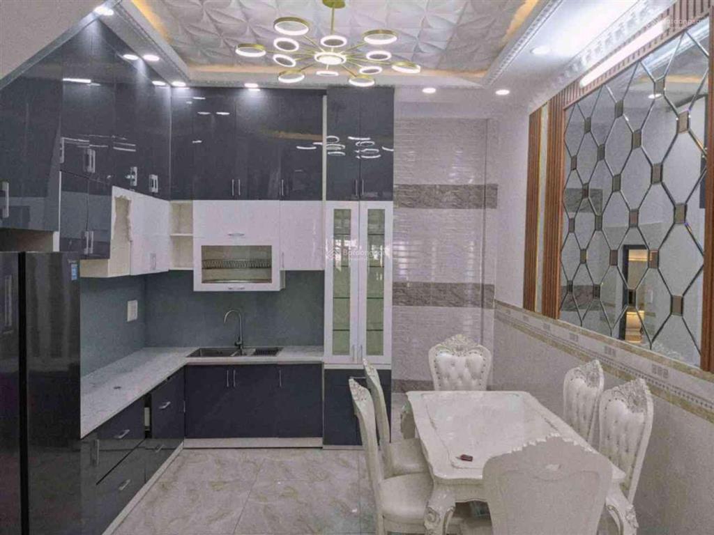 Bán nhà quận 7, 4 tầng, mặt tiền kinh doanh 25m, 74m2, ngang 4m, giá 9,8 tỷ