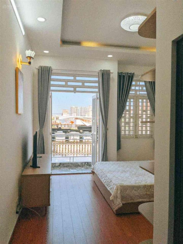 Bán nhà quận 7, 4 tầng, mặt tiền kinh doanh 25m, 74m2, ngang 4m, giá 9,8 tỷ