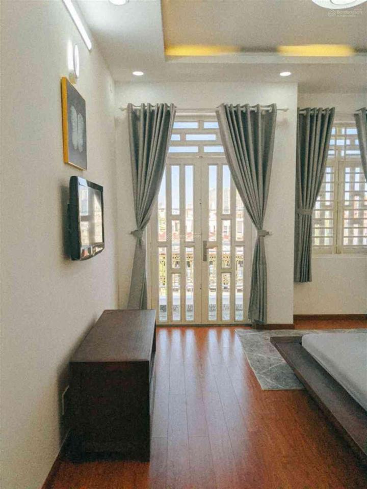 Bán nhà quận 7, 4 tầng, mặt tiền kinh doanh 25m, 74m2, ngang 4m, giá 9,8 tỷ