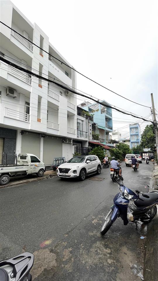 Nhà 1/ bình long, góc 2 mặt tiền hẻm thông kinh doanh 12m, dt 5m x 16m có thang máy đúc 5