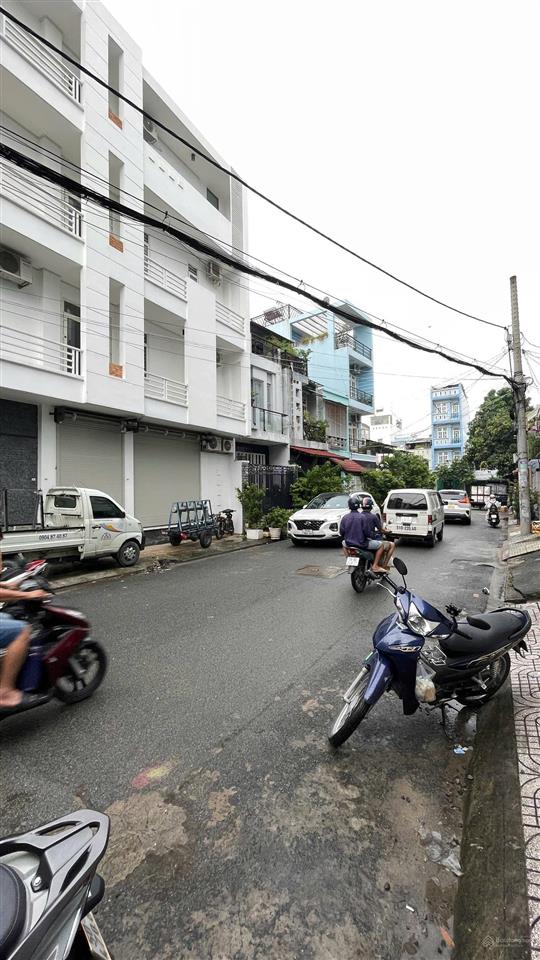 Nhà 1/ bình long, góc 2 mặt tiền hẻm thông kinh doanh 12m, dt 5m x 16m có thang máy đúc 5