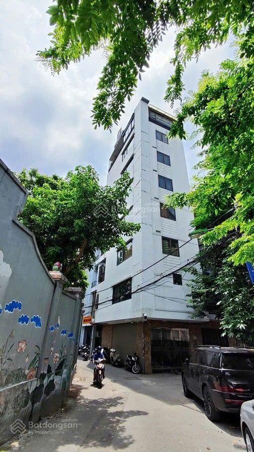 Chính chủ bán toà văn phòng 8 t thang máy phố nguyễn văn huyên cầu giấy dt50m2 mt4,8m lô góc ,oto
