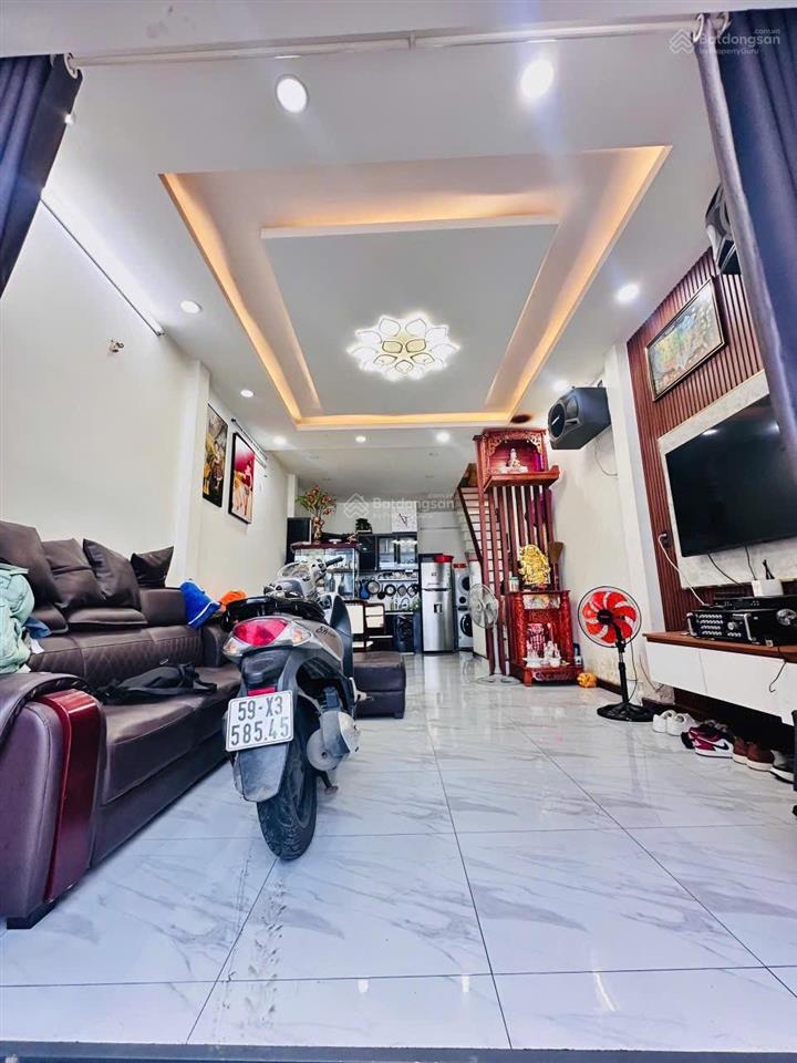 Nhà đẹp ngay ngã tư bốn xã dt 4 x 10 đúc tấm hẻm 4m