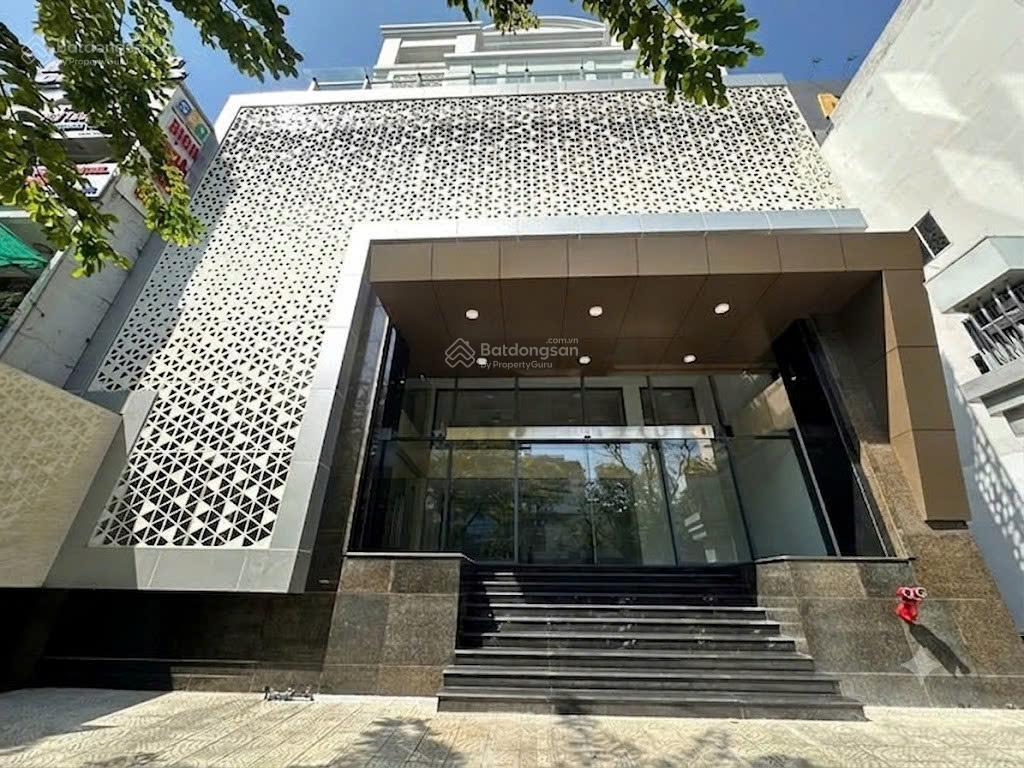 Tòa nhà trường sơn, tân bình  gần sân bay  20x20m  hầm, 7 tầng  văn phòng, thẩm mỹ