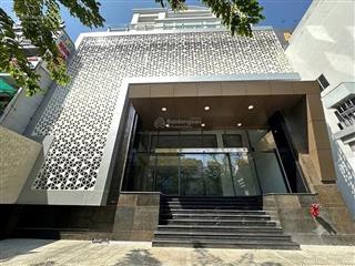 Tòa nhà trường sơn, tân bình  gần sân bay  20x20m  hầm, 7 tầng  văn phòng, thẩm mỹ