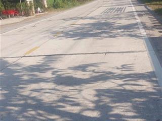 Cần bán 1 lô đất vườn 67 công 180m mặt tiền đất nằm ngay ngã ba, gần chợ, ủy ban và trường học