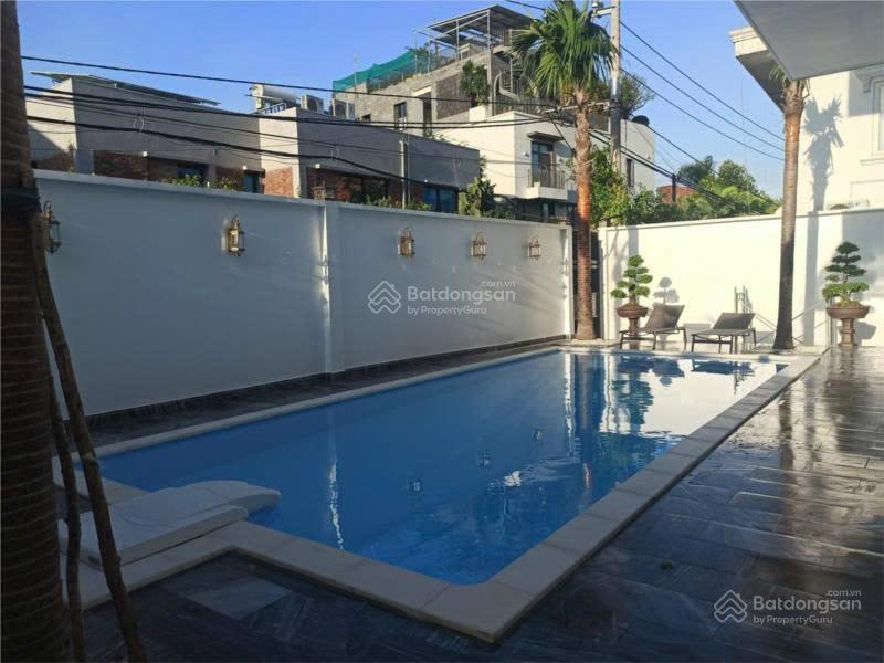 Villa compound. quốc hương thảo điền q2.dt 16,5 x30 kết cấu 3 tầng sân vườn .120 ty hdt 5500usd