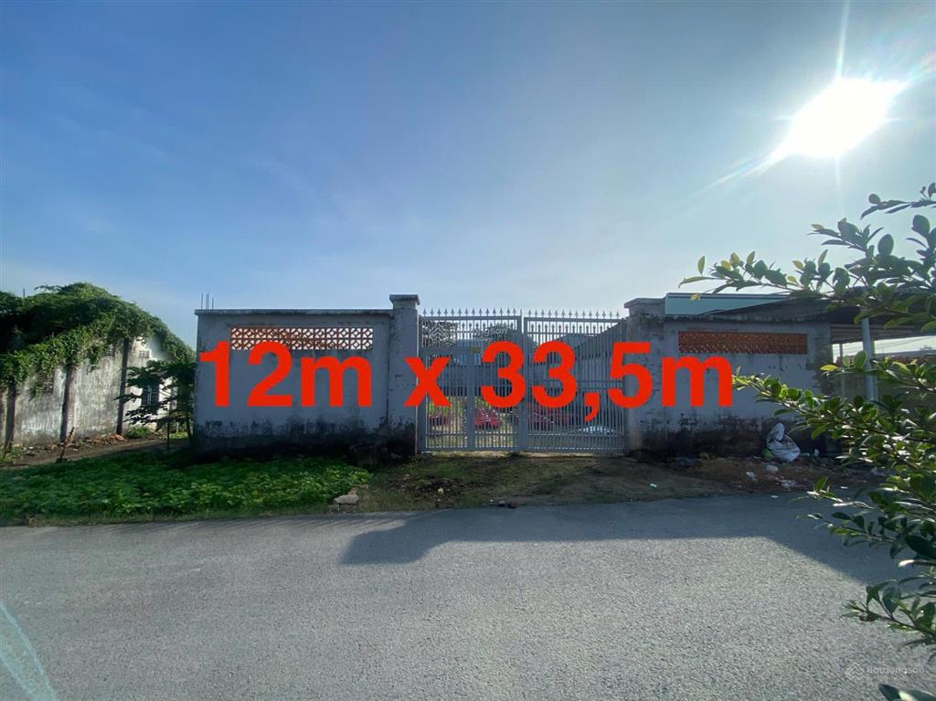Bán lô mặt tiền đường (12m x 33m) thổ cư 100%, gần chợ tân thạnh đông, vuông vức đẹp dân cư đông