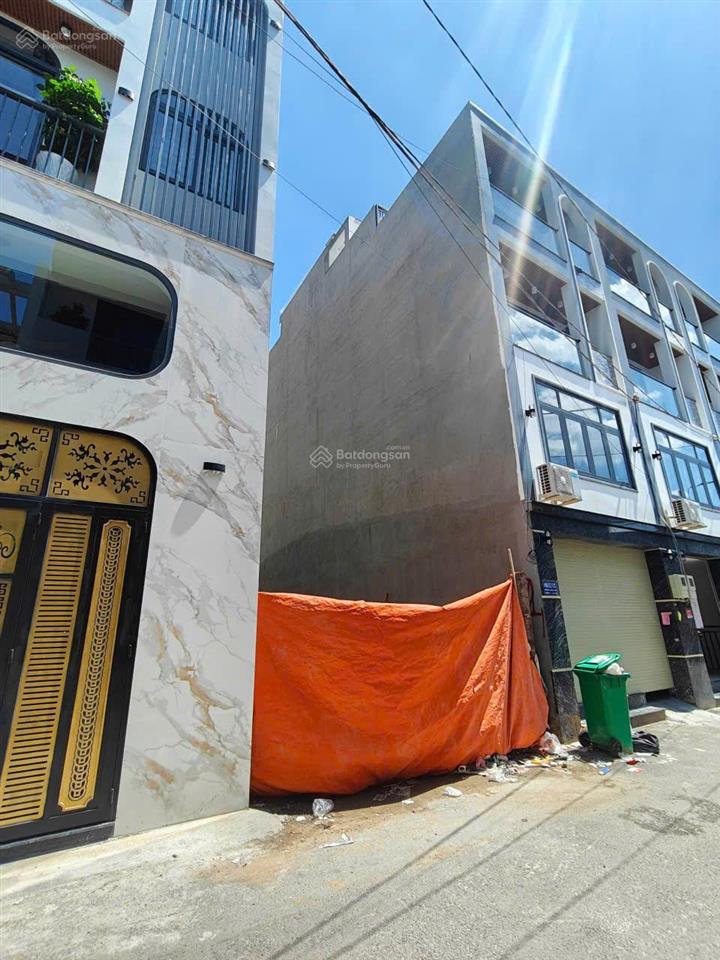 2 mt trước sau, 4x16m dương quảng hàm, mật độ xd 99% đất, xây 7 tầng.