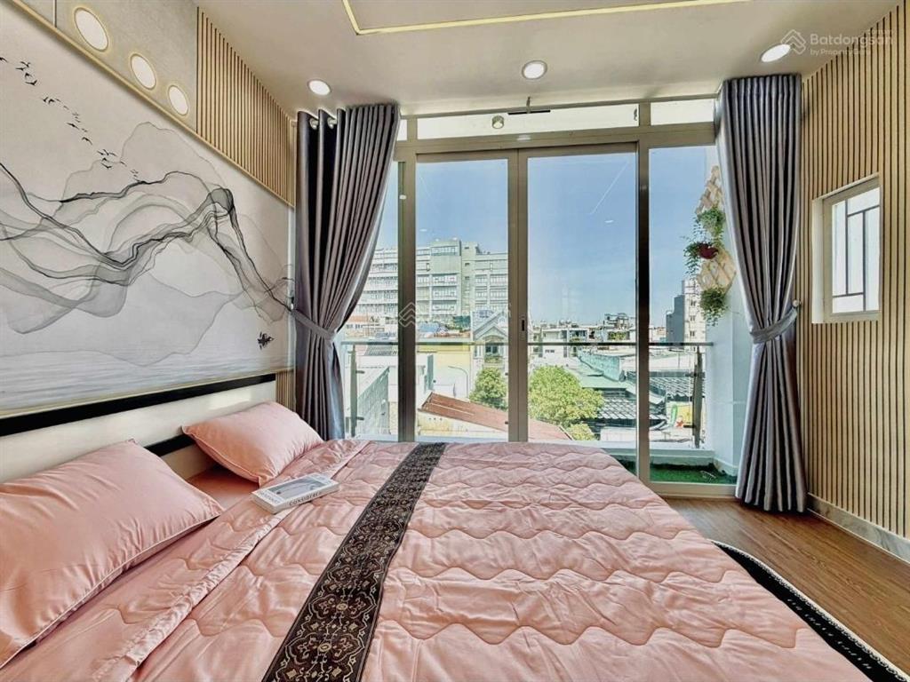 Nhà 4 tầng đúc btct  5pn  hẻm ba gác thông sát mặt tiền đường phan văn trị  nở hậu