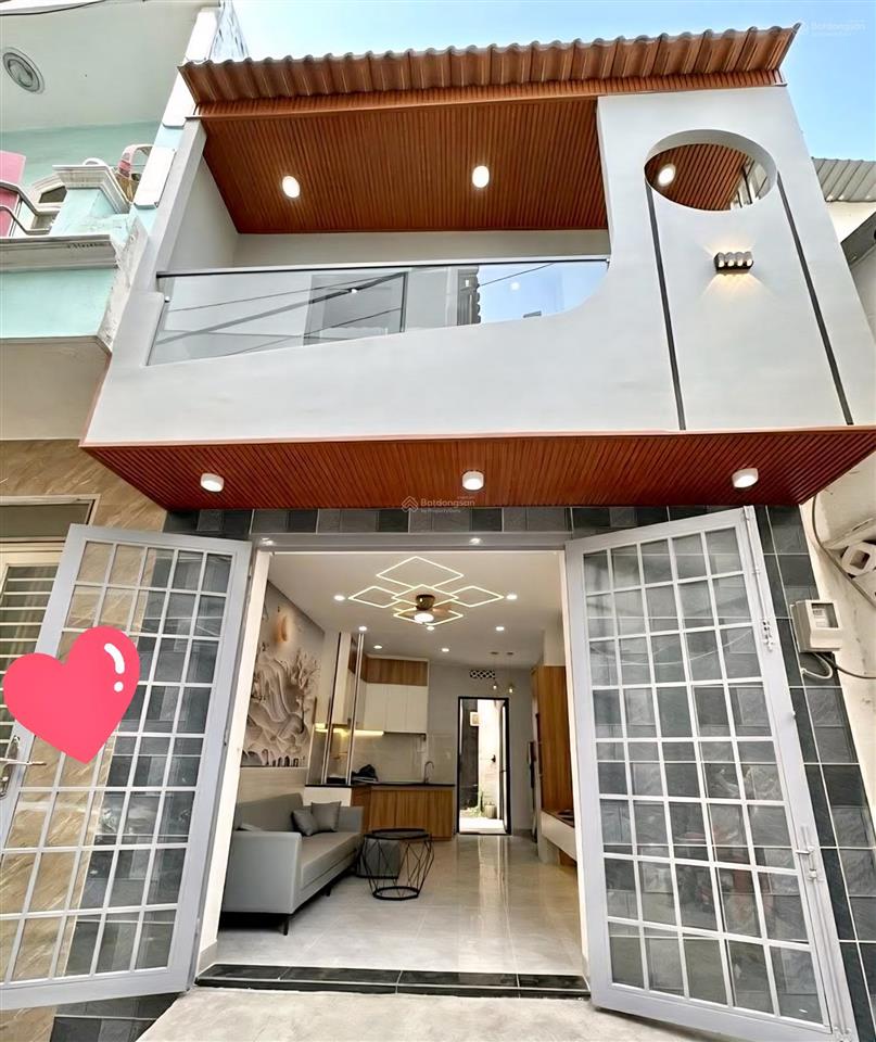 Chưa tới 4đồng  nhà 2 mặt hẻm, xe hơi tới nhà  nhà mới dọn vào ở ngay