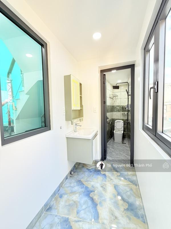 Bán nhà mới bùi đình túy dt 41m2  4 tầng  hẻm 3m 1 căn ra xe hơi  an ninh  chỉ 6 tỷ
