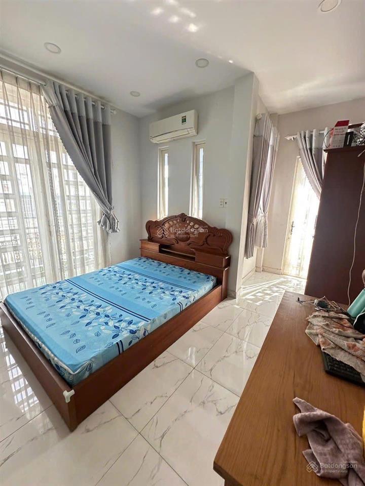 Nhà 5 tầng hxh 1/ thống nhất  dt 6,5x14m  7pn full công năng  giá 9,3t (tl)