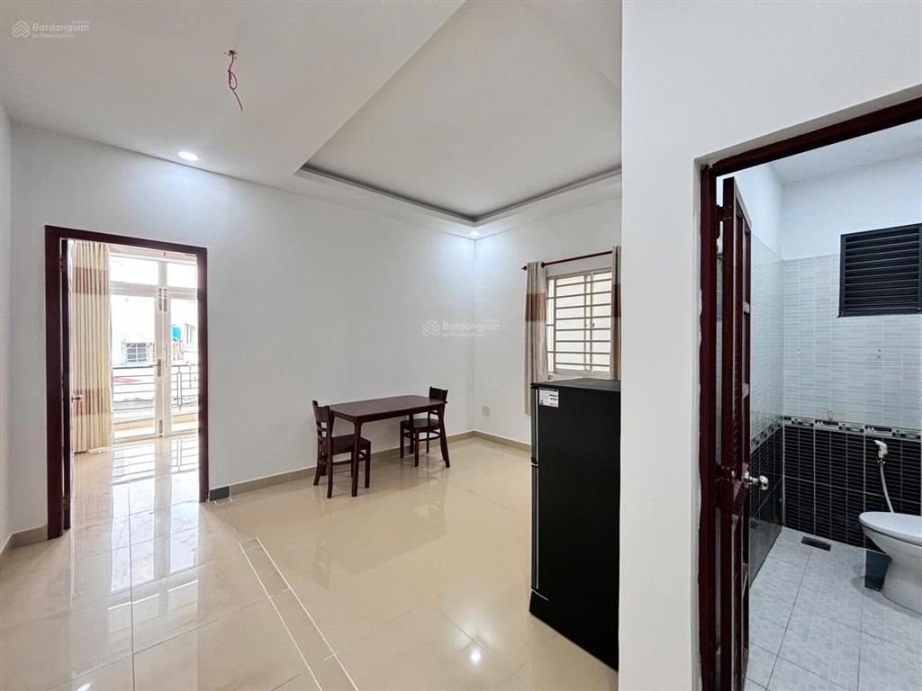 Cho thuê căn hộ 1 phòng ngủ ban công tách bếp full nội thất ngay trục quang trung phan huy ích