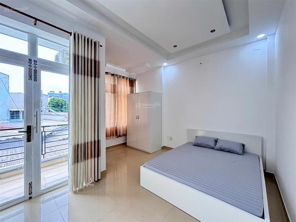 Cho thuê căn hộ 1 phòng ngủ ban công tách bếp full nội thất ngay trục quang trung phan huy ích
