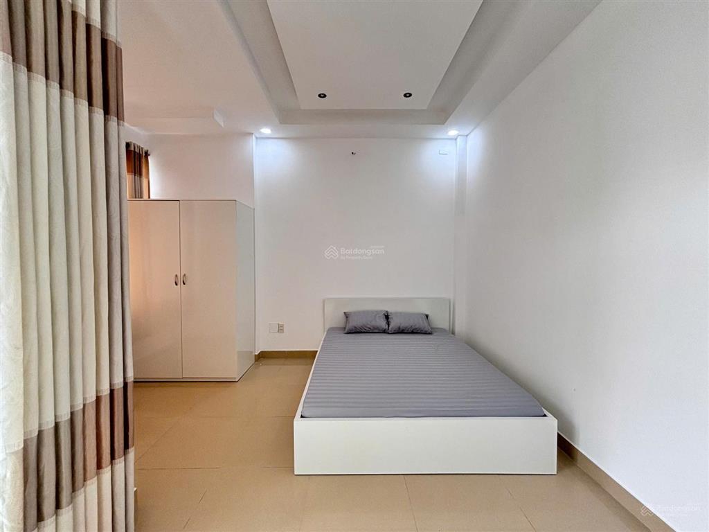 Cho thuê căn hộ 1 phòng ngủ ban công tách bếp full nội thất ngay trục quang trung phan huy ích