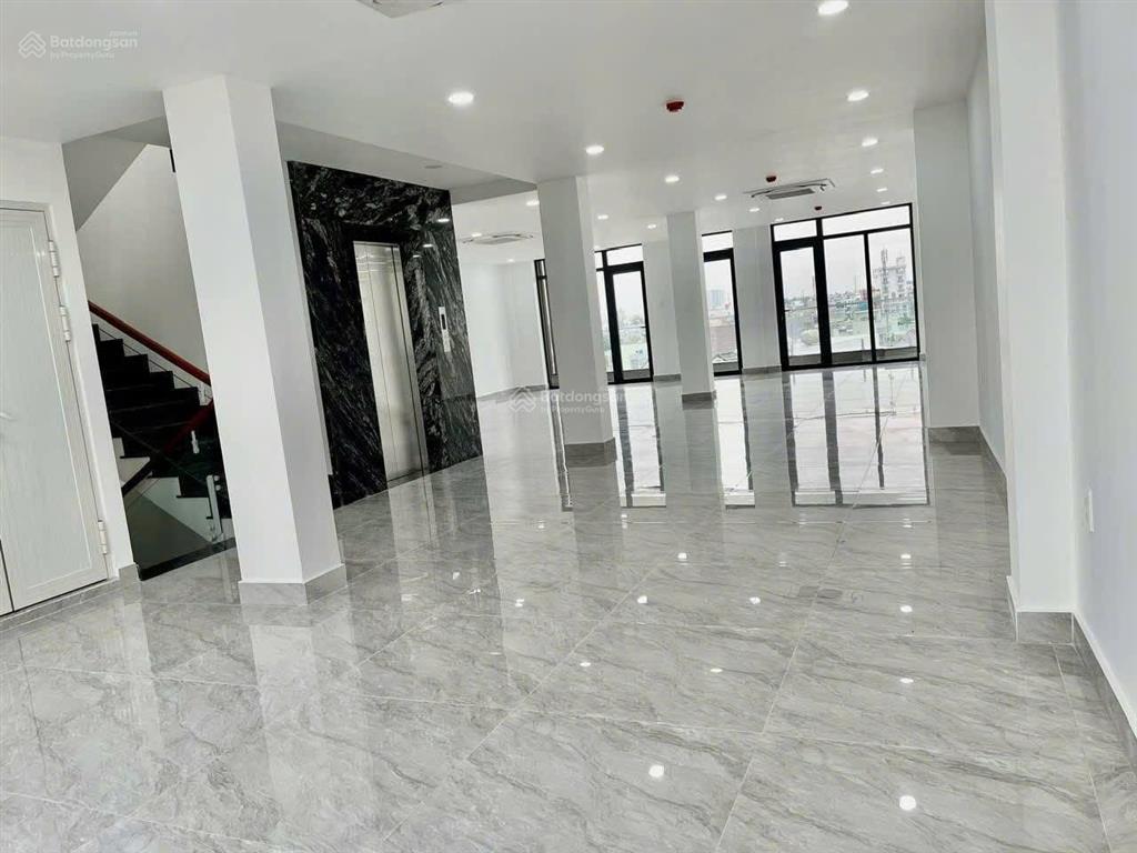 Bán toà nhà văn phòng mặt tiền trần thị cờ, 200m2 ngang 8m nở hậu 9m, 1 hầm 7 lầu, thang máy 630kg