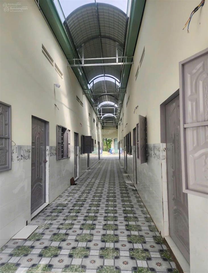 Bán dãy trọ 12 phòng 300m2 mt 12m, đường nc, lai uyên, bàu bàng, giá 1,05 tỷ, sát kcn, thu 13tr/th