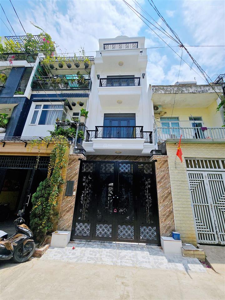 Bán nhà đối diện kdt đông tăng long, 1 trệt 3 lầu 4pn, hẻm xe hơi 6m thông, ko lỗi phong thủy.