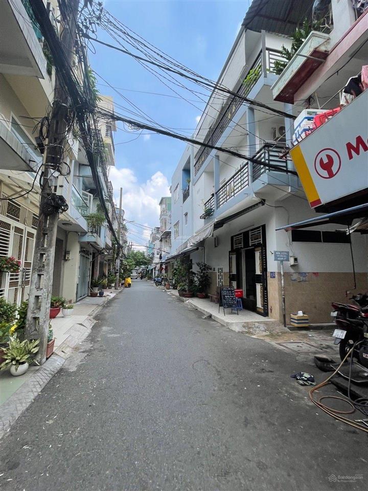 Nhà mới 3 tầng  lạc long quân  quận 11  hẻm xe hơi  3,x t.ỷ