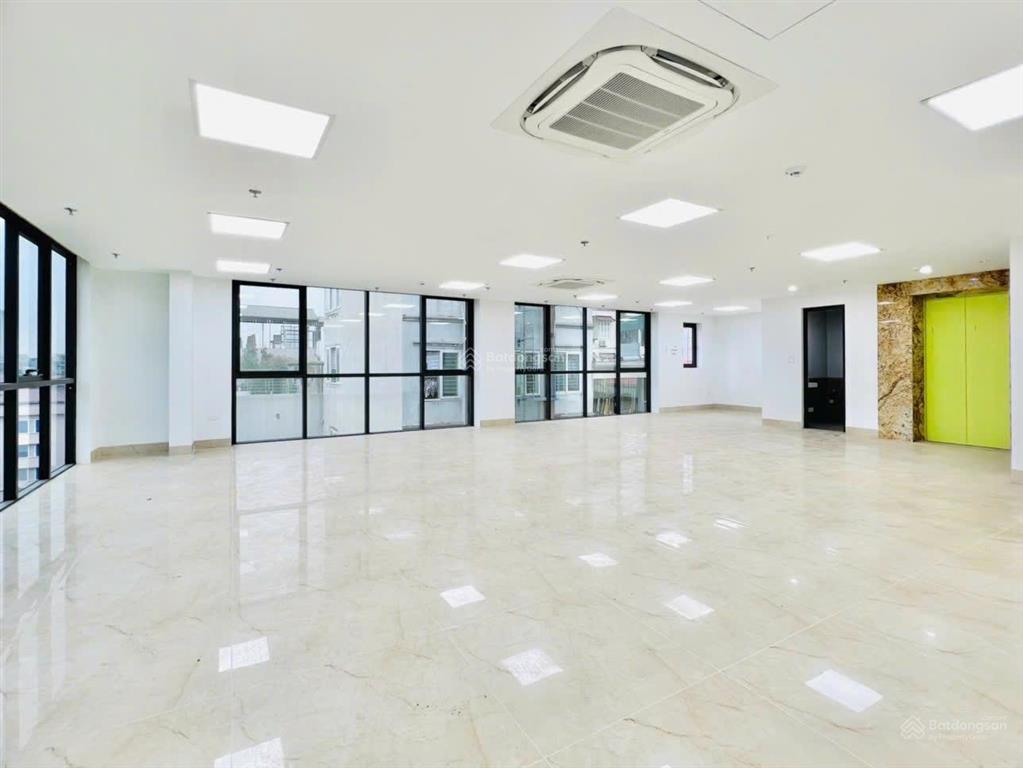 Toà building trung kính dt 105m2 x 9t mt 7m thông sàn, thang máy, vỉa hè rộng, mặt phố, dt 200tr/th