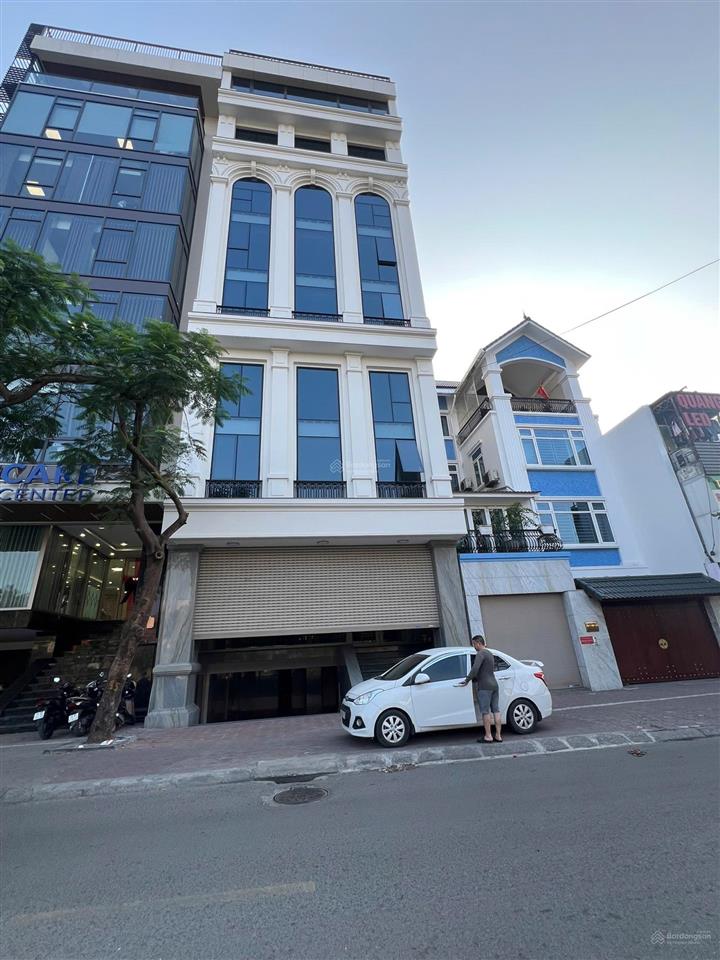 Toà building trung kính dt 105m2 x 9t mt 7m thông sàn, thang máy, vỉa hè rộng, mặt phố, dt 200tr/th